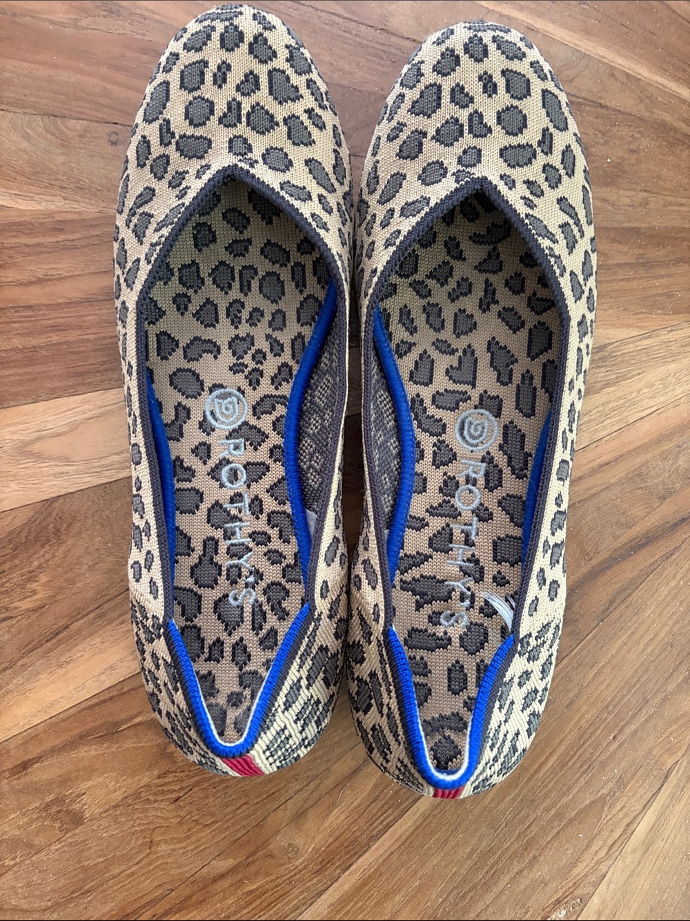 Rothy's Leopard Print Slip-On Flats in Beige, Black and Blue Trim